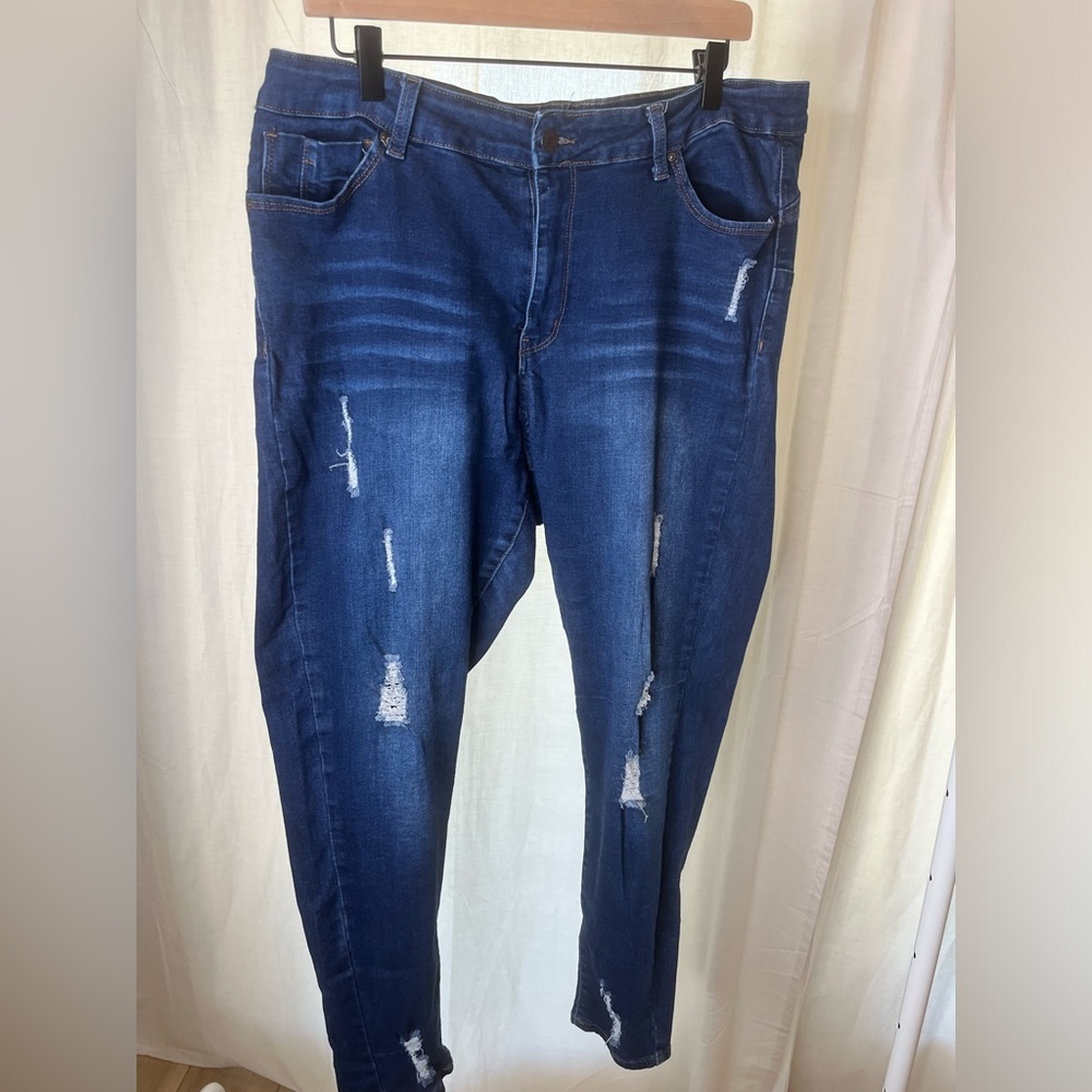 Wax distressed jeans